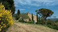 Rolling Hills Italy -  Farmhouse located in Val di Chio for sale