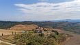Rolling Hills Italy - For sale beautiful country house near Asciano, in Tuscany.