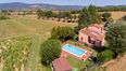 Rolling Hills Italy - For sale delightful country house with pool in Cortona.