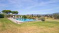 Rolling Hills Italy - Vendesi incantevole torre in pietra con piscina a Cortona.