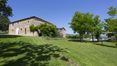 Rolling Hills Italy - For sale outstanding stone house in the heart of Val d’Orcia
