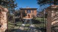 Rolling Hills Italy - Elegant brick farmhouse for sale in Montepulciano, Siena.