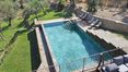 Rolling Hills Italy - For sale gorgeous stone house with pool overlooking Cortona.