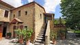 Rolling Hills Italy - Portion of rustic farmhouse for sale in Cortona, Arezzo.