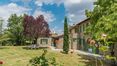 Rolling Hills Italy - For sale wonderful stone farmhouse of 385 square meters surrounded by the countryside of Cortona with pool, outbuilding and about 1, 5 ha of land.
