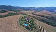 Rolling Hills Italy - Charming panoramic farmhouse for sale in Val d'Orcia
