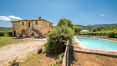Rolling Hills Italy - Lovely farmhouse with swimming pool for sale in Radicondoli.