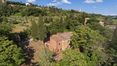 Rolling Hills Italy - Interesting farmhouse for sale in Pienza