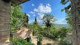 Rolling Hills Italy - Interesting farmhouse for sale in Pienza