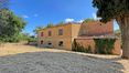 Rolling Hills Italy - Interesting farmhouse for sale in Pienza