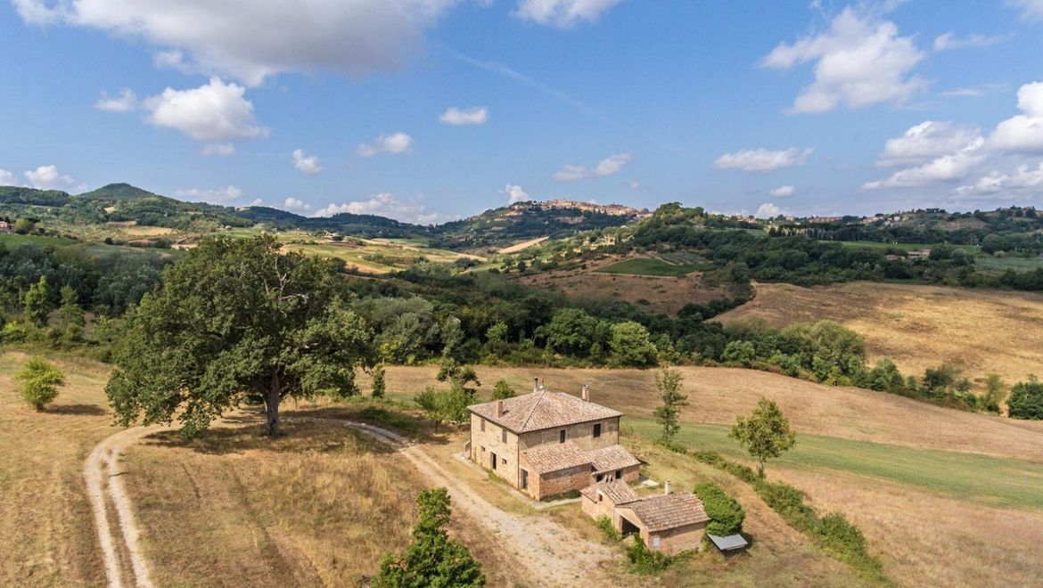 Rolling Hills Italy - Semi renovated farmhouse with views of Montepulciano.